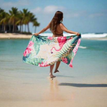 A girl holding a Quick Dry, Sand Free, Light Weight, Compact and Ecofriendly Microfiber Beach Towel from La Toalla